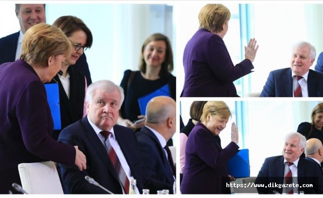Almanya İçişleri Bakanı Seehofer koronavirüs nedeniyle Merkel'in elini sıkmadı