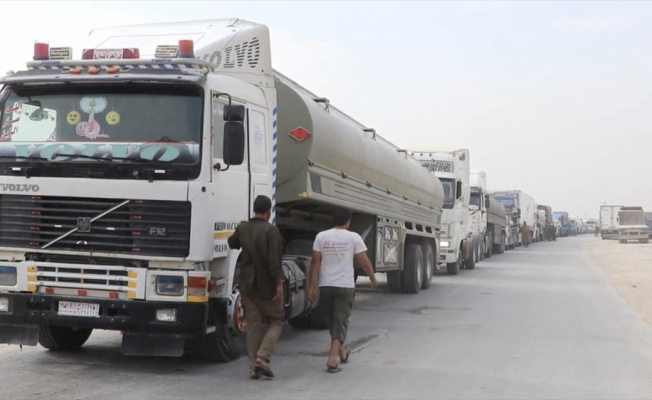 Ter&ouml;r &ouml;rg&uuml;t&uuml; YPG/PKK ile Esed rejimi arasındaki petrol ticareti s&uuml;r&uuml;yor