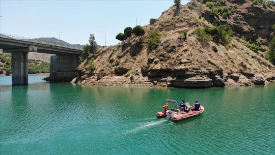 Kayıp Doku'nun bulunması için Uzunçayır Baraj Gölü'nün kısmen boşaltılması çalışmaları sürüyor