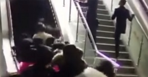 Yine Çin yine yürüyen merdiven kazası
