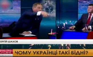 Canlı yayında Ukrayna başkan adayının yüzüne su fırlattı