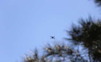 Bacanağını öldüren zanlıyı polis ormanda drone ile aradı