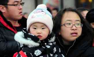 Nüfus artış hızı yavaşlayan Çin çocuk sayısı kısıtlamalarını esnetiyor