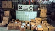 Adana&#039;da &#039;antifrizli cam suyu&#039; yazılı kolilerde bin litre etil alkol ele geçirildi