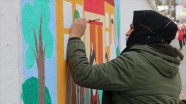 Afrinli gençler, kentteki barış ve kardeşliği çizdikleri grafitilerle anlatıyor