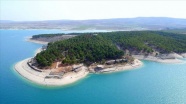 Atatürk Baraj Gölü, Salda&#039;yı andıran kıyısıyla ziyaretçi bekliyor