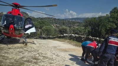Aydın'da y&uuml;r&uuml;y&uuml;ş sırasında rahatsızlanan kişi, ambulans helikopterle hastaneye sevk edildi