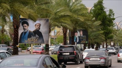 Bağdat sokaklarına Ali Hamaney ile M&uuml;cteba Hamaney posterleri asıldı