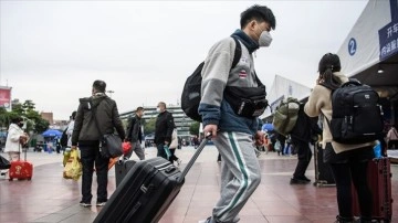 Çin'in Çıngdu şehrinde yurt dışından gelenlerin karantina süresi 2 güne indirildi