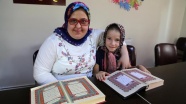 Down sendromlu Fatma Nur'un Kur'an-ı Kerim'i okuma sevinci