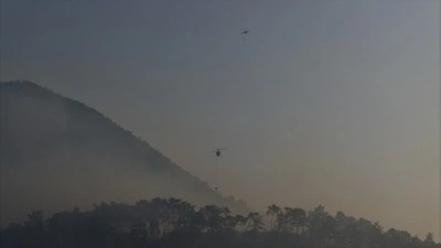 Fethiye'deki orman yangınına m&uuml;dahale s&uuml;r&uuml;yor