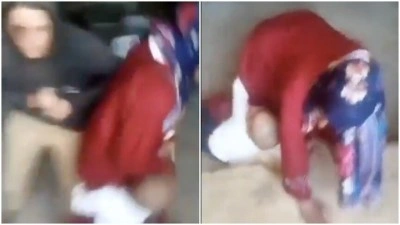 Filistin topraklarını gasbeden bir İsrailli, Filistinli anneyi &ccedil;ocuğunun yanında darbetti