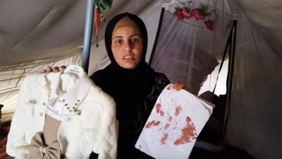 Gazzeli 9 yaşındaki Ritac, gittiği okuldan İsrail saldırısı nedeniyle beyaz kefenle d&ouml;nd&uuml;