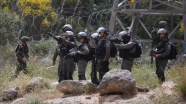 İsrail güçleri 14 Filistinliyi gözaltına aldı