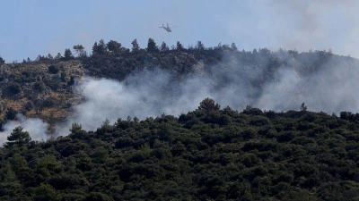 Kaş'ta makilik alanda &ccedil;ıkan yangına m&uuml;dahale ediliyor