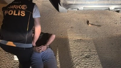 Kırmızı b&uuml;ltenle aranan Alman ş&uuml;pheli Bodrum'da yakalandı