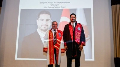 KM&Uuml;'den TGF Başkanı Taha Akg&uuml;l'e fahri doktora &uuml;nvanı