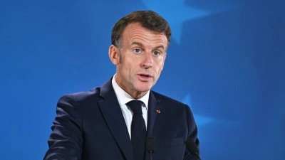 Macron, &uuml;&ccedil;&uuml;nc&uuml; &uuml;lkelerde "geri d&ouml;n&uuml;ş merkezleri oluşturulmasına" karşı olduğunu belirtti