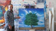 Ressam İsmail Acar, yanan ormanların ihyası için Bizim Dünyamız Vakfı&#039;na eserini bağışladı