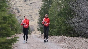 Şampiyon atletler olimpiyat kotası için patika yollarda güç depoluyor