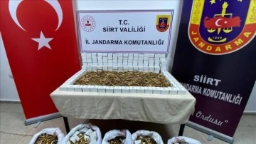 Siirt'te bir otomobilde 15 bin 610 mermi ele geçirildi