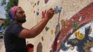 Suriye sınırındaki ilçenin sokakları Yakup öğretmenin çizimleriyle renklendi