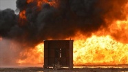 Suudi Arabistan'ın Cazan bölgesine düşen roket mermisi, petrol tesisinde yangına neden oldu