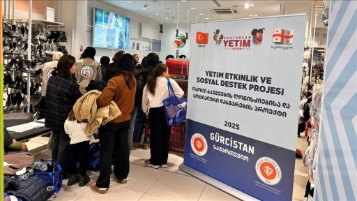 TDV'den G&uuml;rcistan'da 650 yetime giyim yardımı
