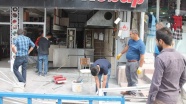 Van'daki terör saldırısında zarar gören iş yerleri onarılıyor