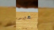 YPG/PKK'lı teröristler sivillere ait arazileri ateşe verirken görüntülendi